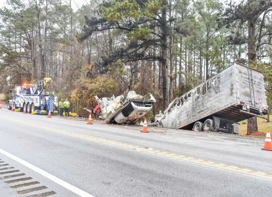 Three hurt in fiery head-on crash