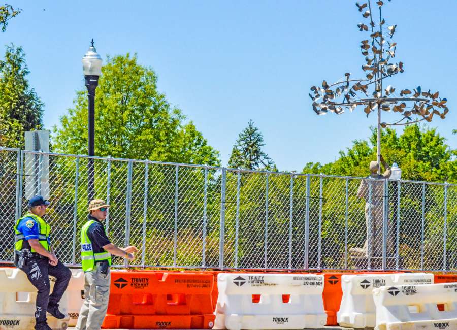 Barricades, fences going up for Saturday rally