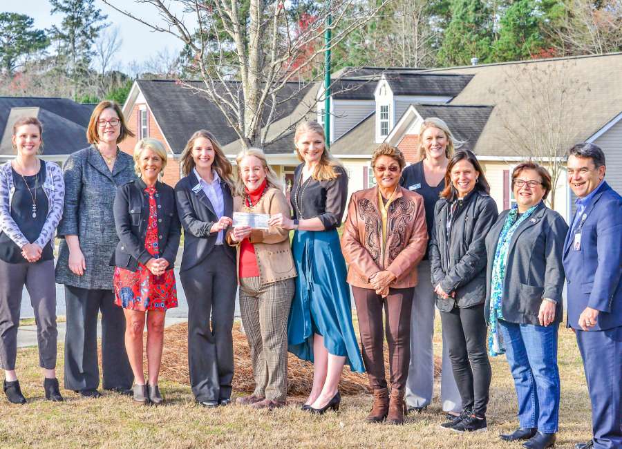 100 Coweta Women Who Care donate to Christian City