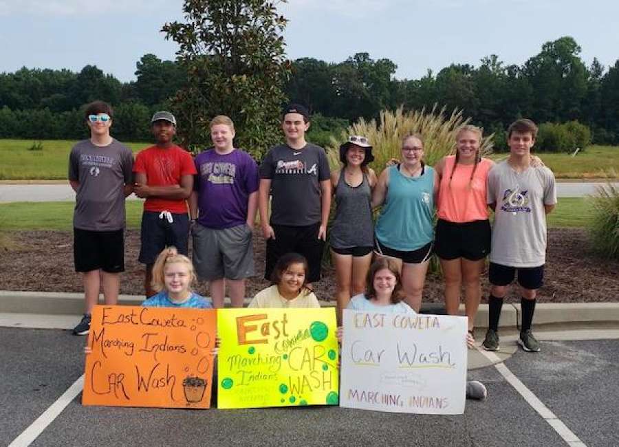East Coweta band holds car wash fundraiser
