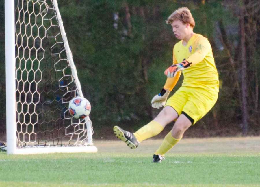 Hawks battle to finish in tough loss to five-time state champions