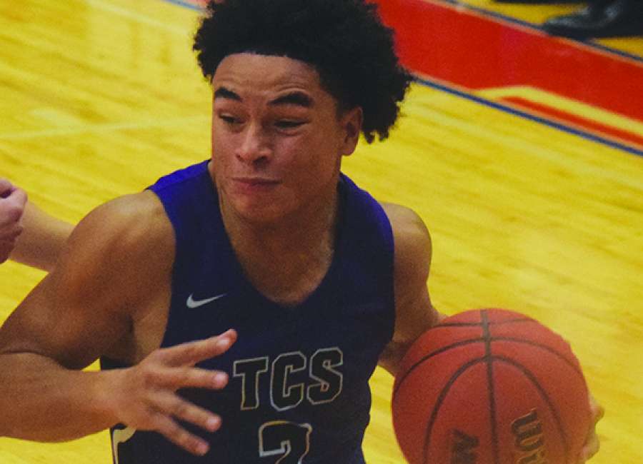 Trinity holds off Heritage in battle of rivals