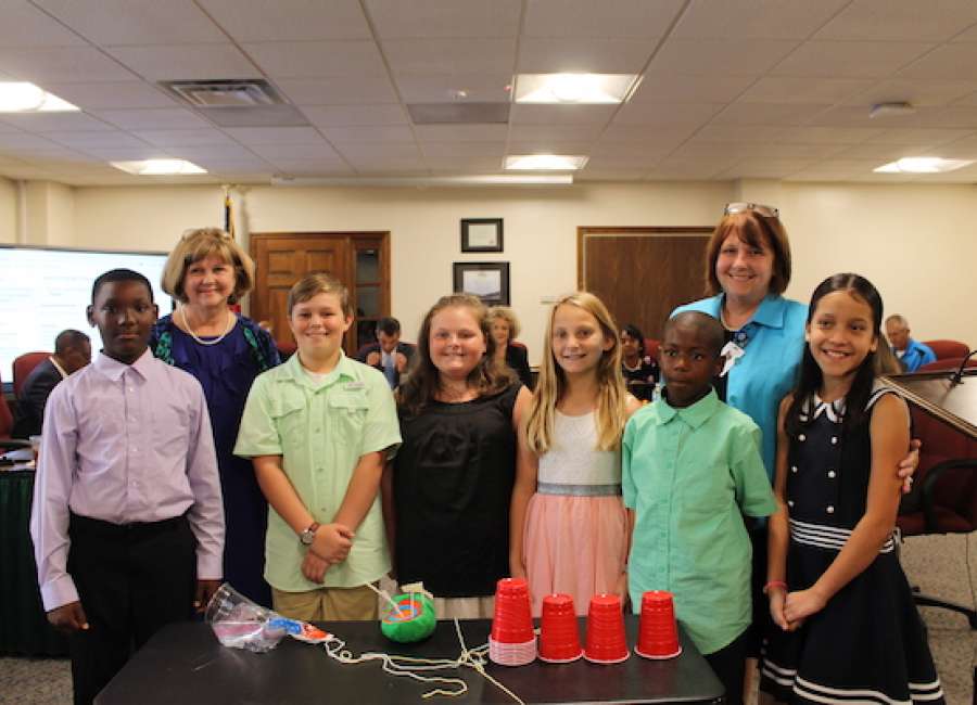 Western Elementary students present science labs to school board