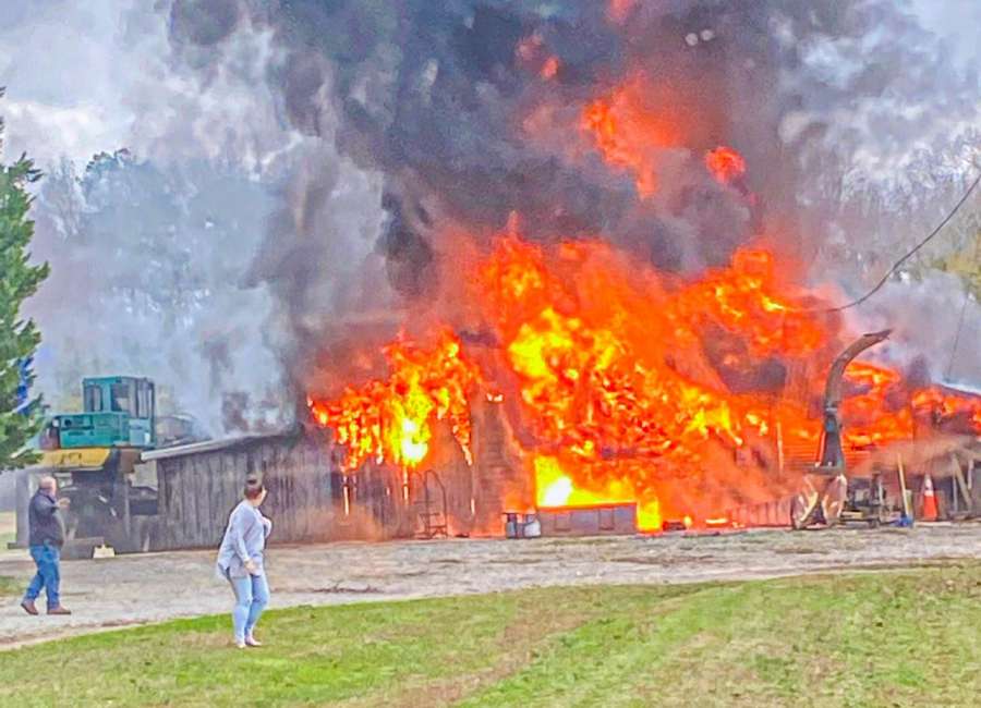 Firefighters battle wind in Turin barn fire