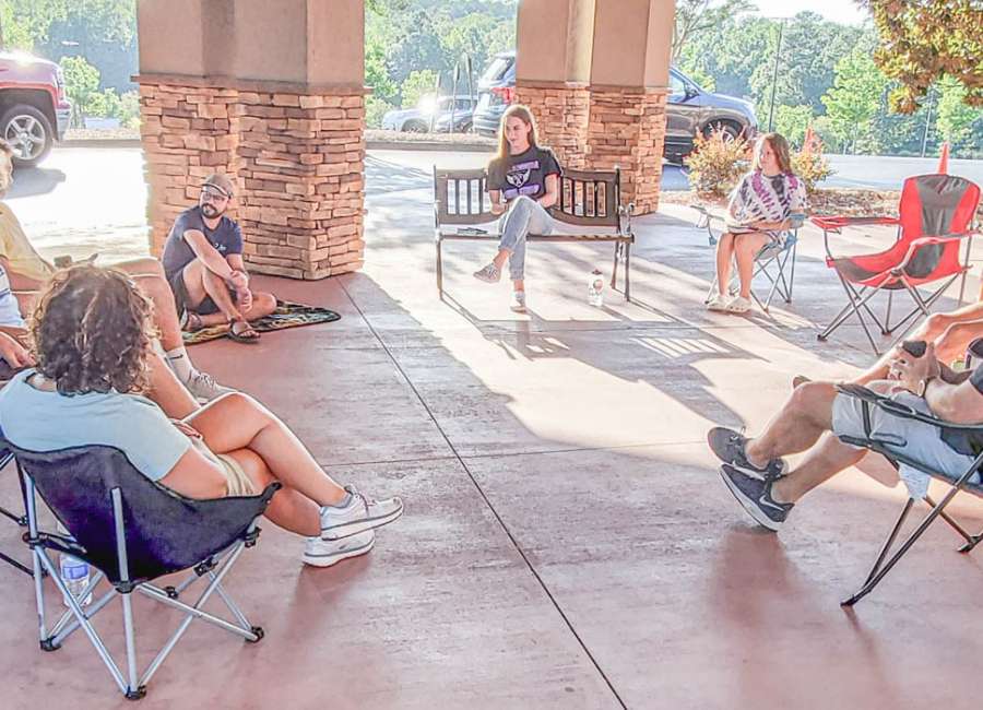 Trinity track team participates in weekly devotions