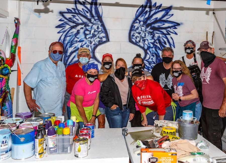 Volunteers help build outdoor classroom for Backstreet Arts