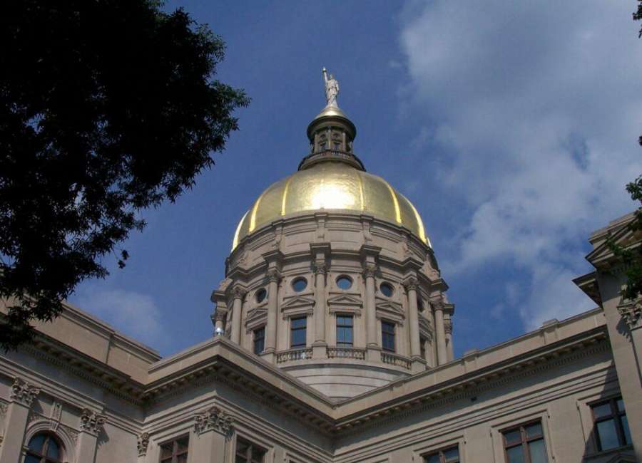 Georgia election bill signing draws federal lawsuit, lawmaker arrest