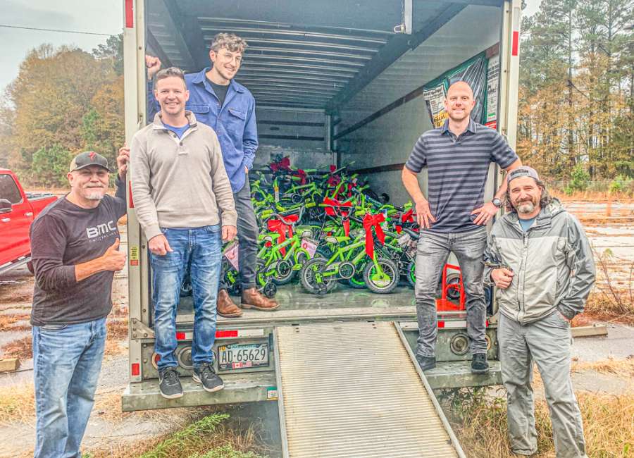 Local bike advocates help deliver 88 bikes
