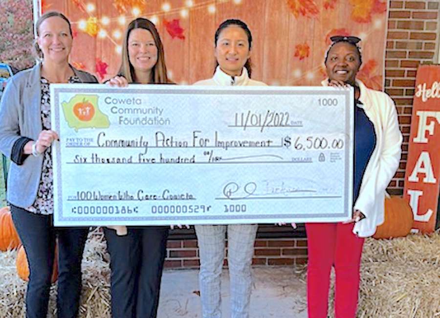 100 Women Who Care awards $6,500 grant to CAFI