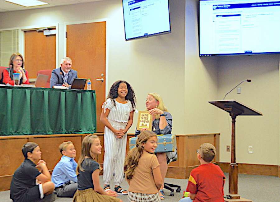 Brooks students demonstrate Mystery History Suitcase activity
