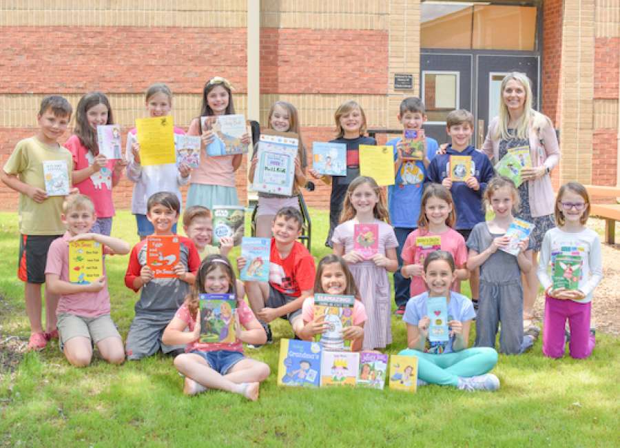 Canongate third-graders collect hundreds of books for needy families