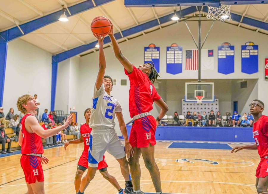 Central Christian hosts Heritage in round ball action