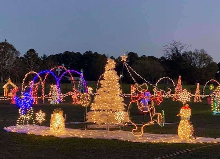 Christmas lights going up at the Benton house again
