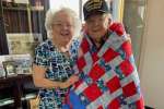 Coweta County Quilts of Valor presents quilts to veterans