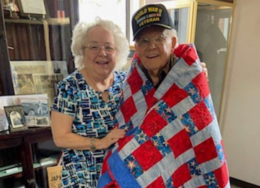 Coweta County Quilts of Valor presents quilts to veterans