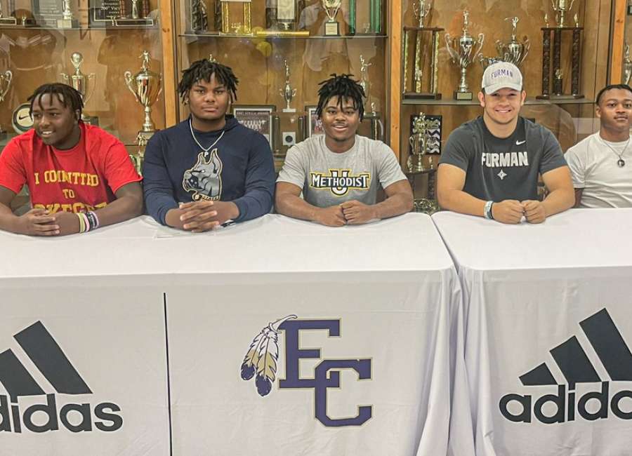 Five East Coweta football players sign