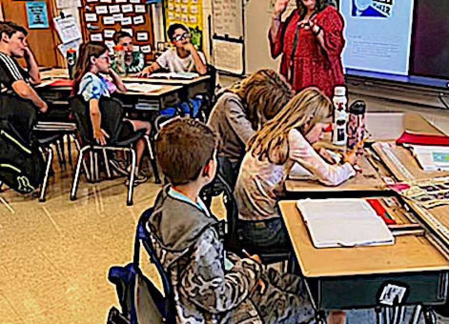 Newspaper reporter visits Thomas Crossroads students