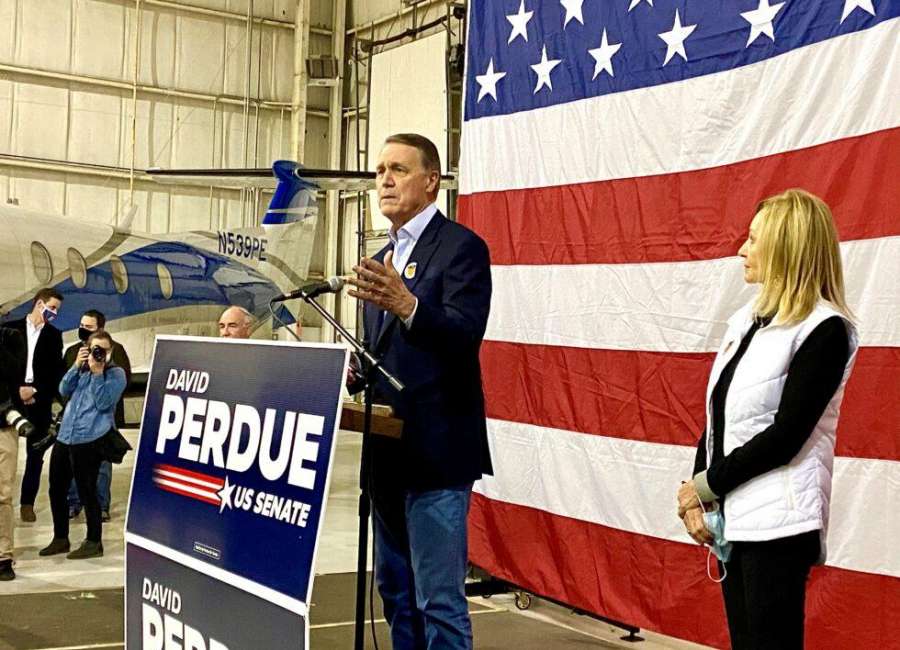 Perdue suing over new law that gives Kemp fundraising advantage
