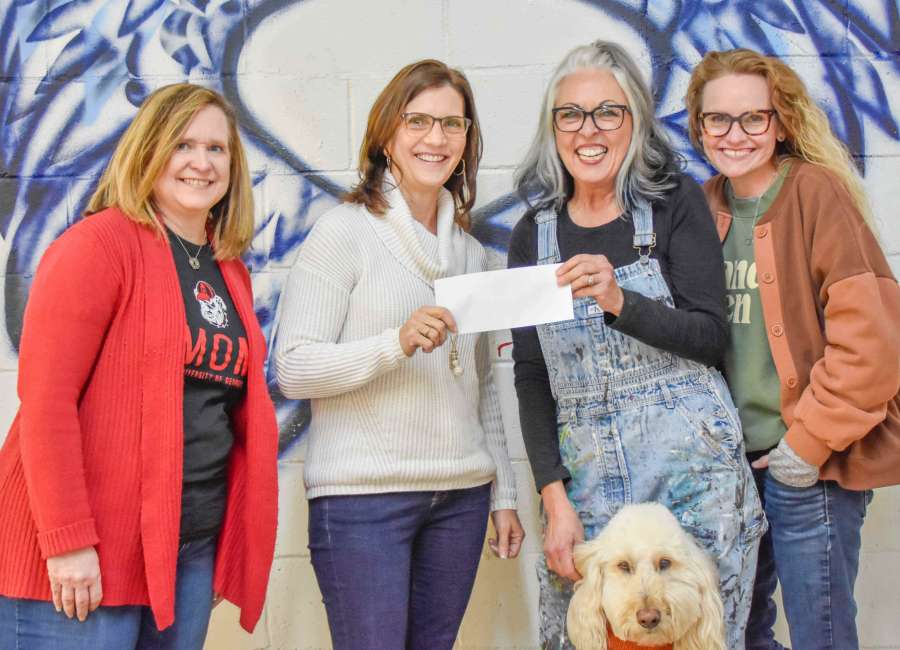Tour of Homes presents check to Backstreet Arts