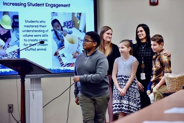 Western students present details of math project to BOE