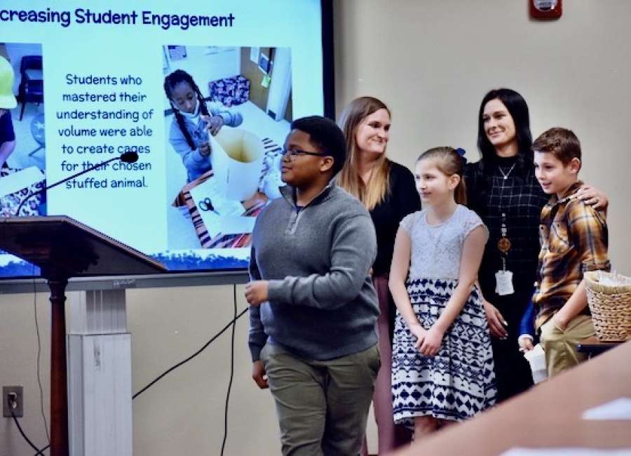 Western students present details of math project to BOE